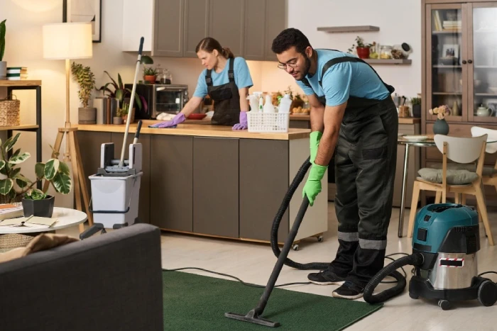 Two professionals doing an end of lease bond clean.